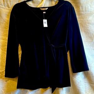 Black faux wrap top-super flattering! Stretchy material. 3/4 length sleeves